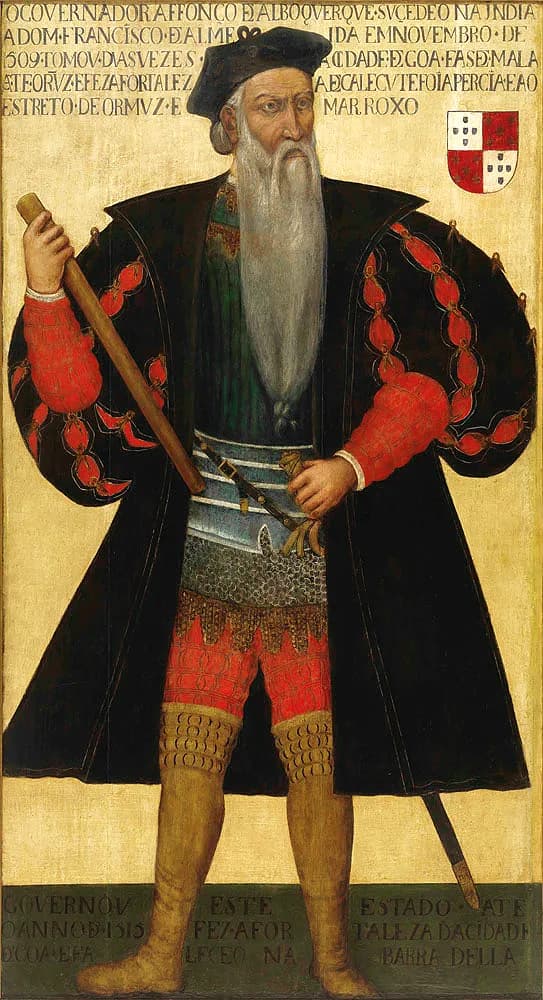 Full-length painted portrait of an old man with a long white beard reaching his waist, wearing a black cap, a black coat over red sleeves and a band of mail at his waist. He holds a baton in his right hand. An inscription in capital letters runs across the top, beside a coat of arms.