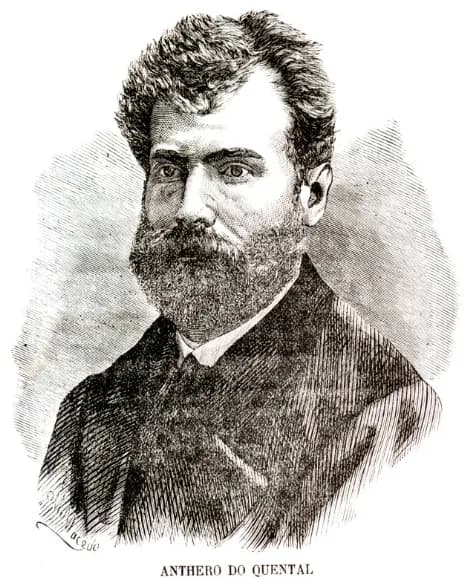 Wood engraving of a man in his early thirties with thick wavy hair, a full dark beard and a dark coat, with the caption Anthero do Quental printed beneath.