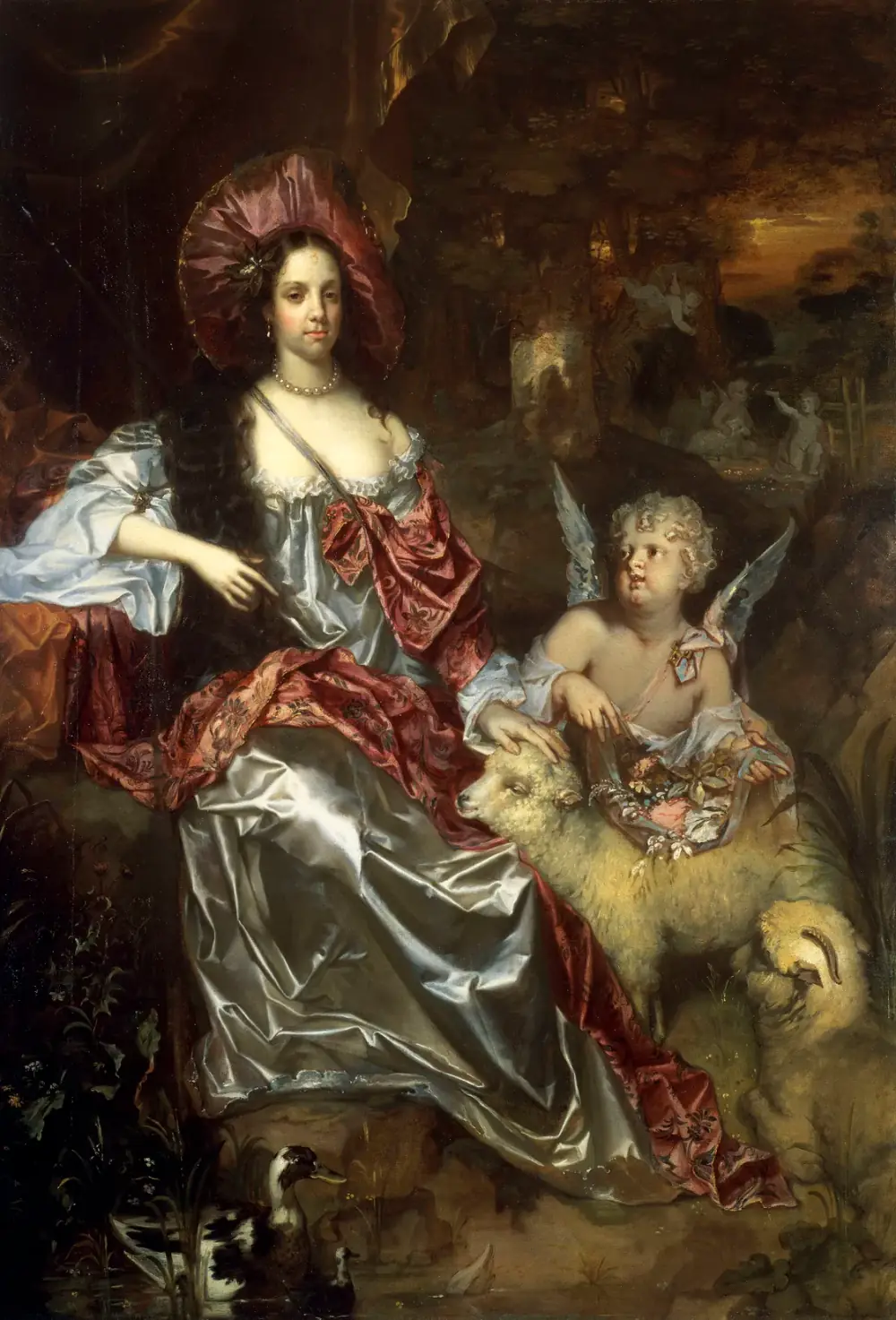 Full-length painting of a seated young woman with long dark hair and a pearl necklace, in a shimmering silver dress draped with a red and gold cloak and a broad hat like a halo. She rests one hand on a lamb, while a winged child beside her holds flowers; a second sheep and ducks are at her feet.