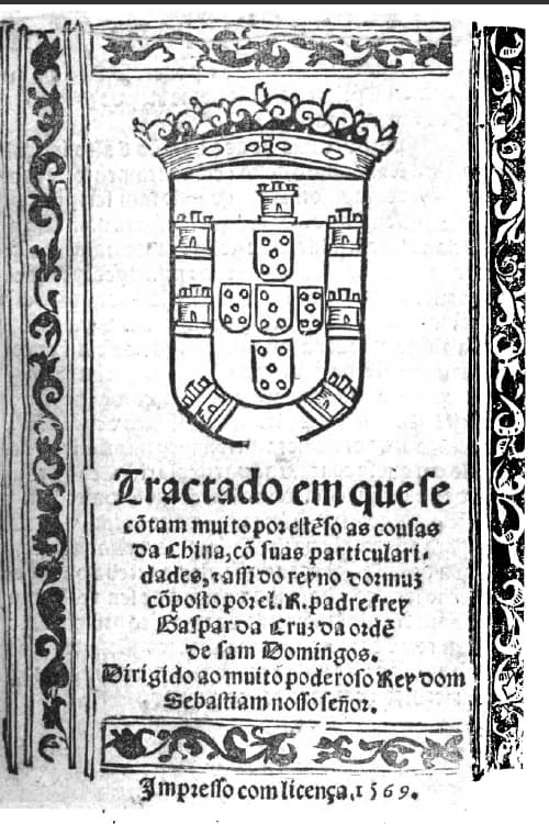 A printed title page inside a border of black and white scrollwork. A large crowned Portuguese royal coat of arms fills the upper half. Below it, black-letter type gives the title, the author Gaspar da Cruz of the Order of Saint Dominic, a dedication to King Sebastião, and at the foot the words printed with licence, 1569.