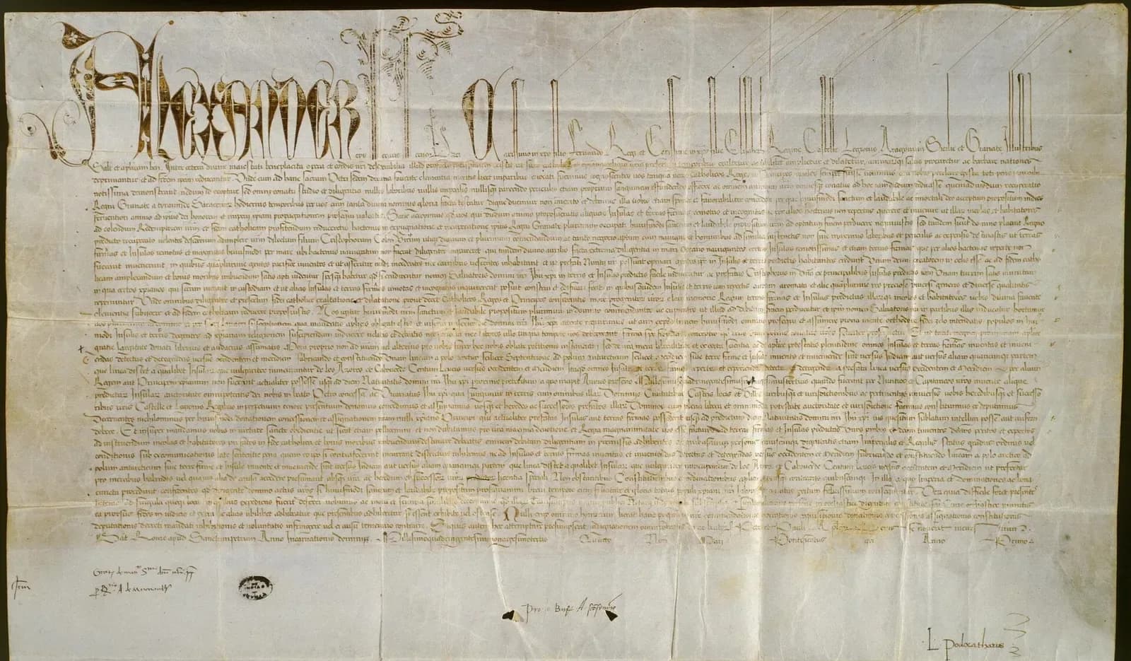A wide sheet of parchment covered in dense Latin script, headed by the name Alexander in large ornamental capitals, with a few signatures and notes below the text.