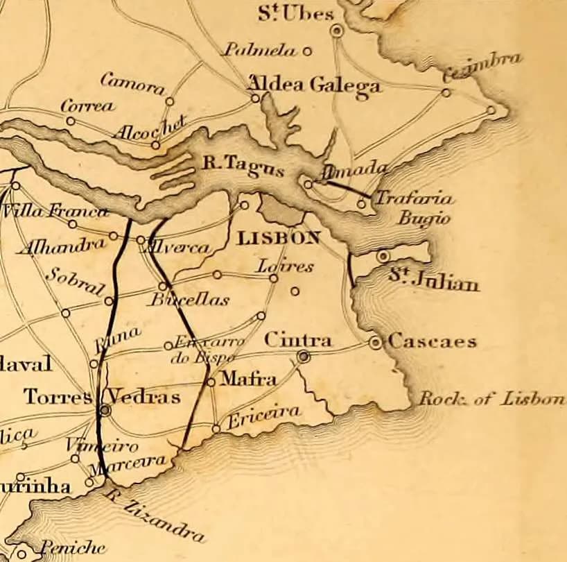 Detail of an old engraved map on yellowed paper, drawn with south at the top, showing Lisbon, the Tagus estuary and the coast. Two thick black lines run down from the river near Alhandra and Alverca to the Atlantic shore, one passing Torres Vedras and the other Mafra, with shorter lines near St Julian and at Almada across the river.