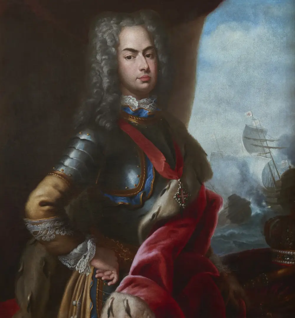 Portrait of a young man in a long curled grey wig, wearing polished armour, a red sash and a red cloak lined with ermine, one hand on his hip. Behind him on the right, sailing warships fire their guns on a stormy sea.