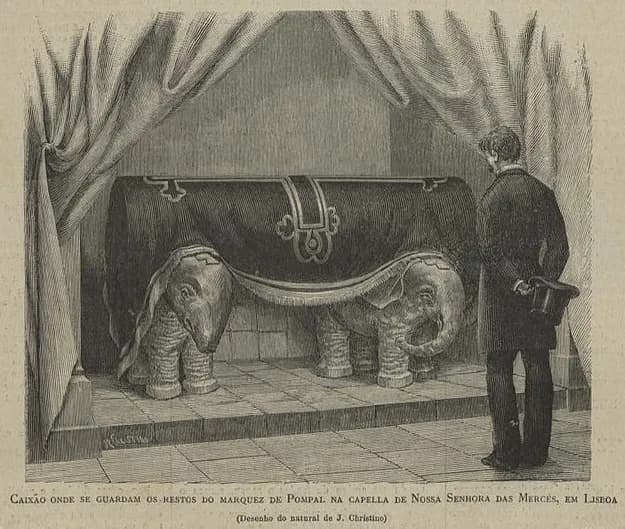 Engraving of a dark rounded coffin resting on two carved stone elephants beneath heavy curtains. A man in a frock coat stands to the right, holding a top hat behind his back, looking at it.