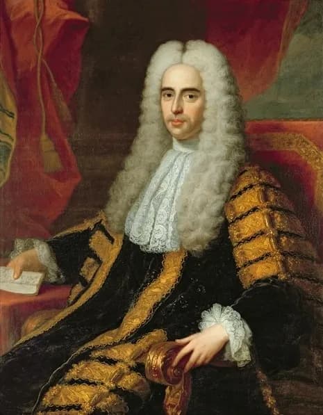 Half-length portrait of a seated man in a long, curled white wig, a lace cravat and a black robe trimmed with broad gold braid, one hand resting on a document.