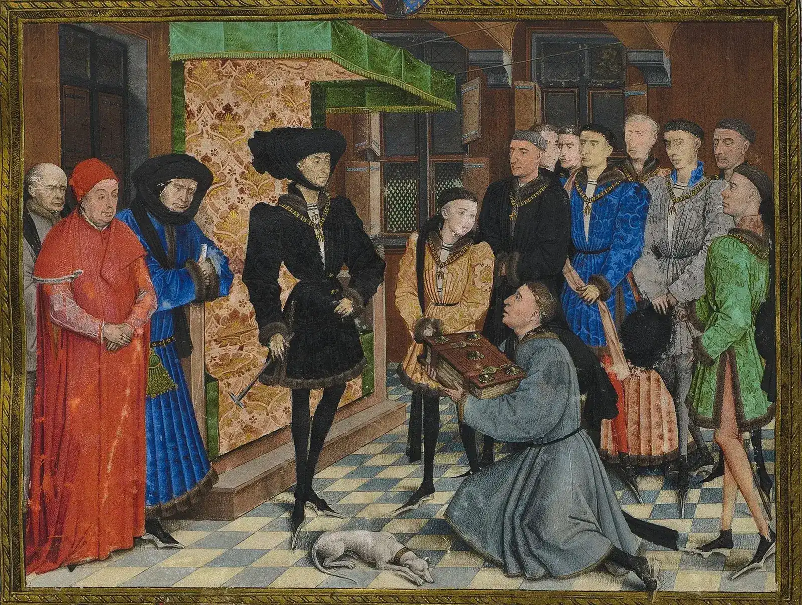 A manuscript painting of a court scene on a chequered floor. A tall man dressed in black with a gold collar stands at the centre while a kneeling man in grey offers him a large book. A boy in gold stands beside him, and courtiers in red, blue, grey and green robes, several wearing gold collars, look on.