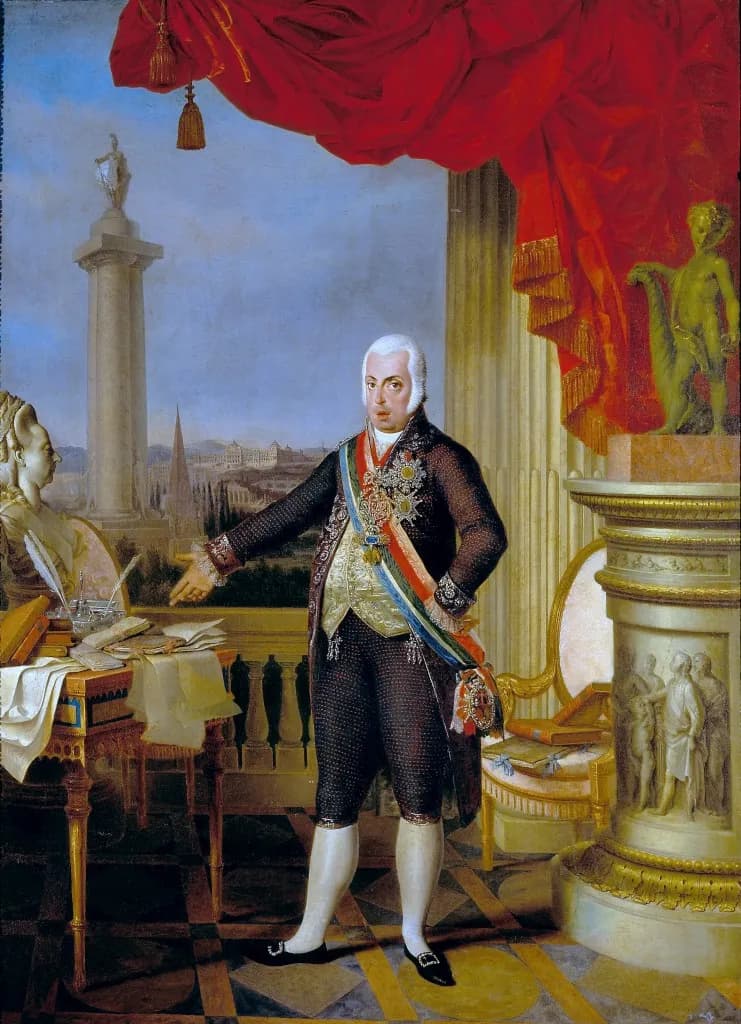 Full-length portrait of a heavy-set man in a powdered wig, a dark embroidered court suit and white stockings, wearing a striped sash and several star-shaped orders. He gestures towards a marble bust and a table piled with papers; behind him a red curtain is drawn back from a view of a tall column topped by a statue.