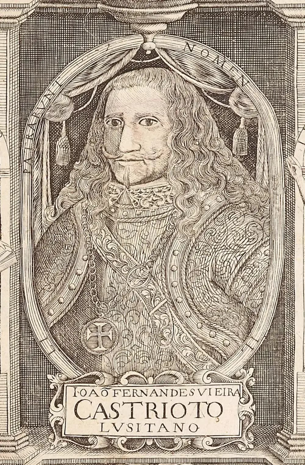 An engraved half-length portrait of a man with long curly hair and a moustache, wearing an embroidered doublet and a chain with a cross badge, framed in an oval with drapery. A tablet below reads João Fernandes Vieira, Castrioto Lusitano.