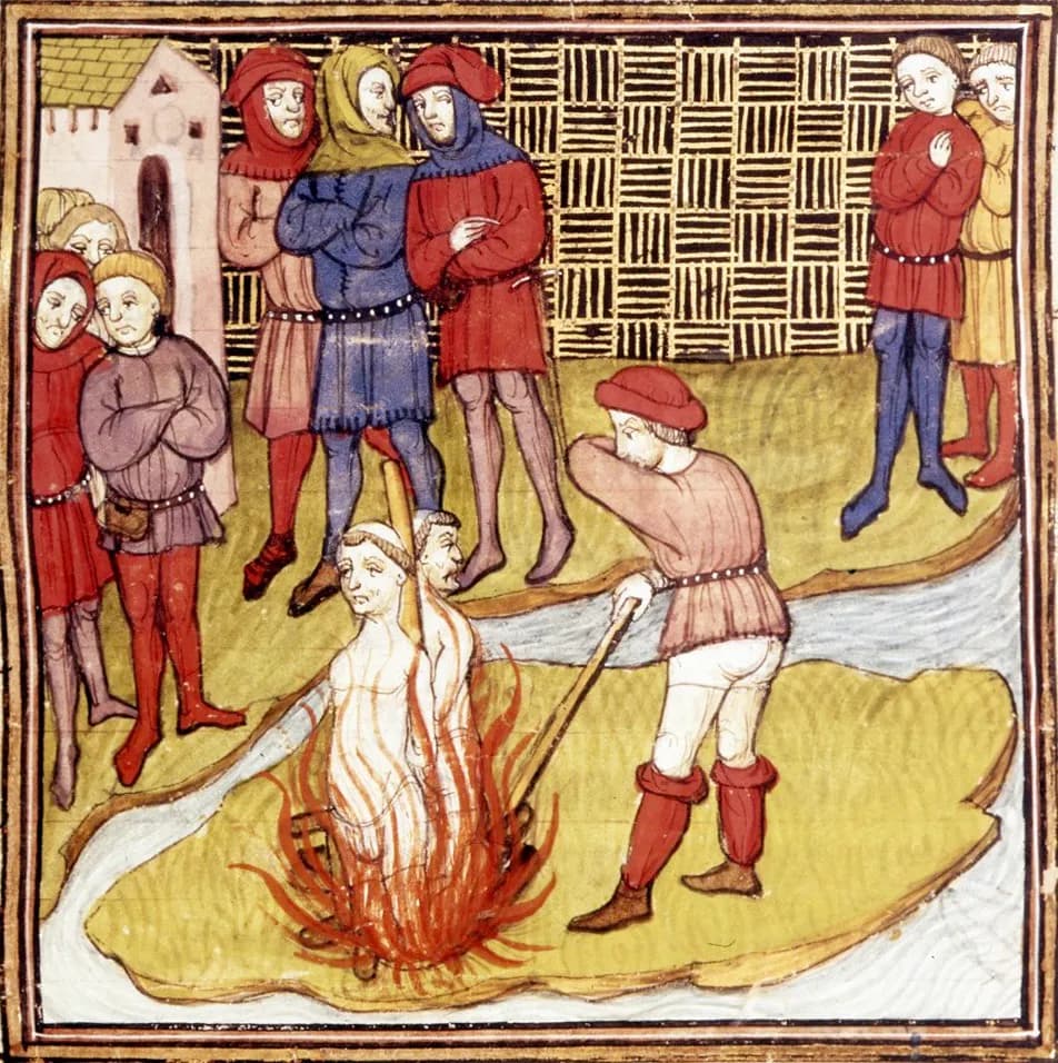 A medieval painting of two men tied together and burning in flames on a small island in a river, while a man in red hose stokes the fire with a long pole and groups of men in coloured tunics and hats watch from the bank.