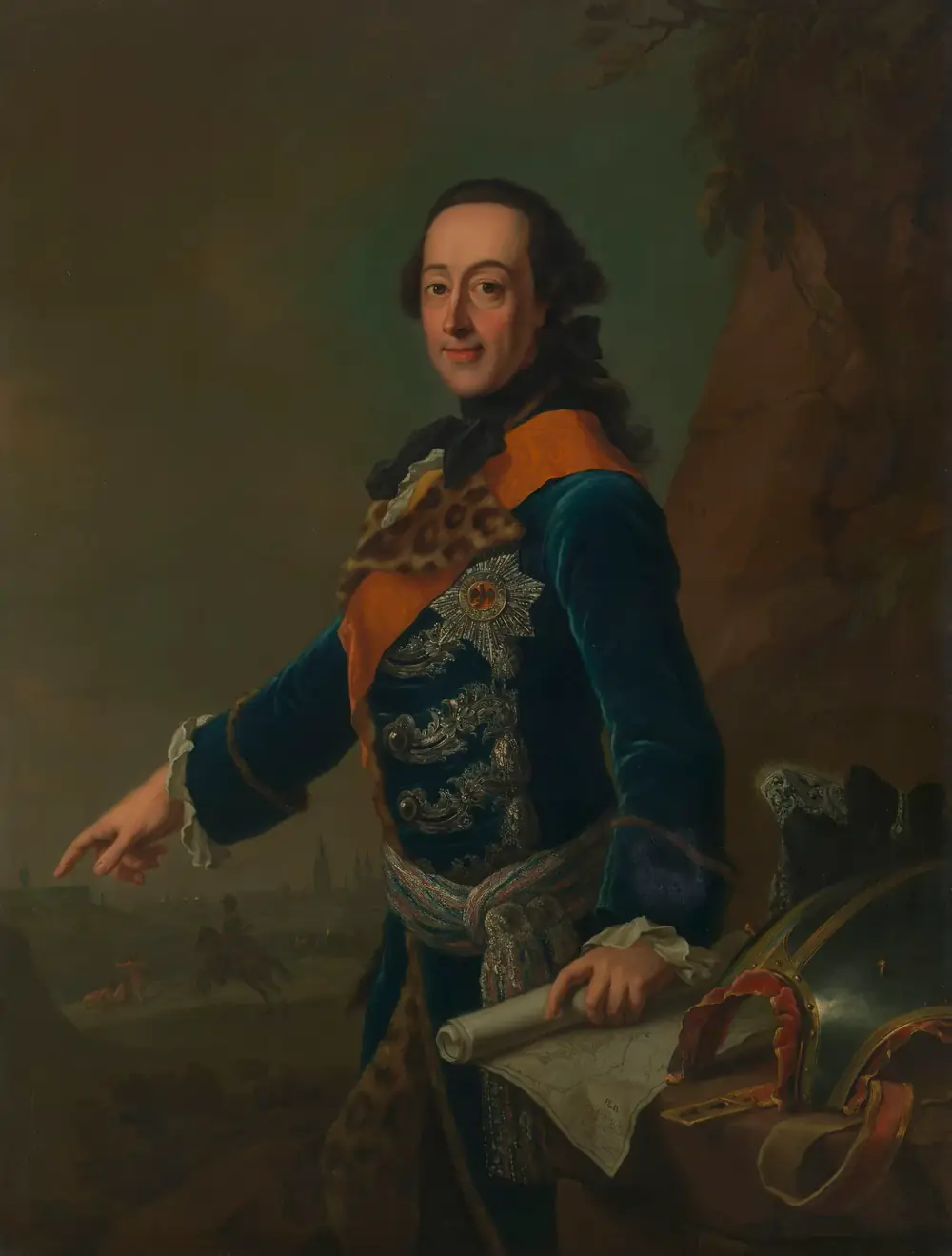 Portrait of a man with dark hair tied back, in a dark blue velvet coat with silver frogging, a leopard-skin trim, an orange sash and a star on his breast. He points with his right hand towards a distant battlefield and holds a rolled map in his left, beside a helmet.