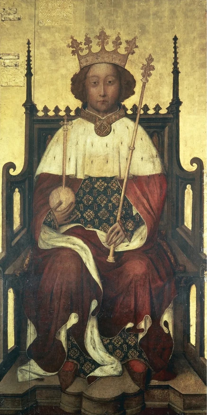 A painted panel of a young king with reddish curled hair, seated full face on a Gothic throne against a gold background. He wears a tall gold crown, a red robe with an ermine cape and a gown patterned with gold, and holds an orb in his right hand and a sceptre in his left.
