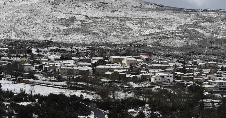 Children and elderly people removed from bus stuck in snow