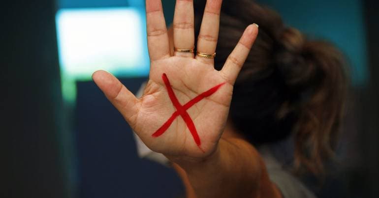 "X" on the palm of the hand activated protocol at the Brazilian Consulate