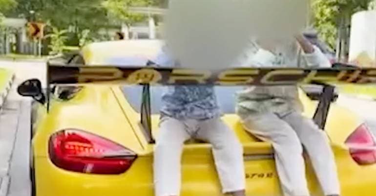 Father with a Porsche Cayman decided to take his children for a ride like this
