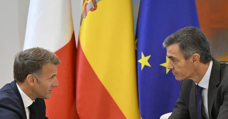 Markets pressure France but applaud elections in Spain