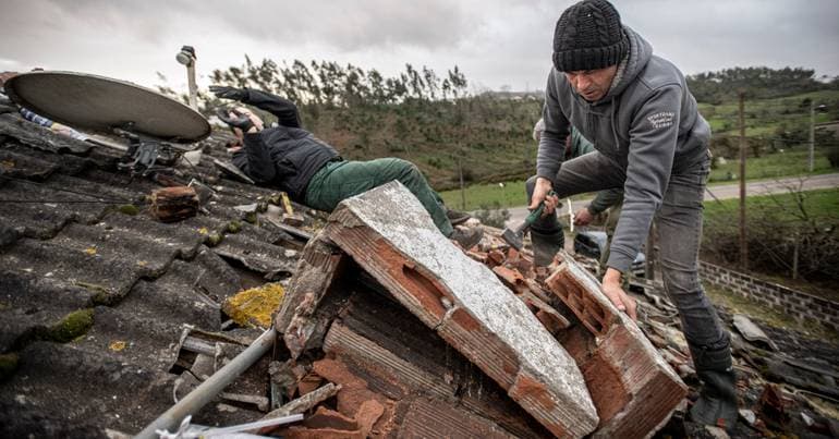 Residents repairing roofs — caught between risk and necessity
