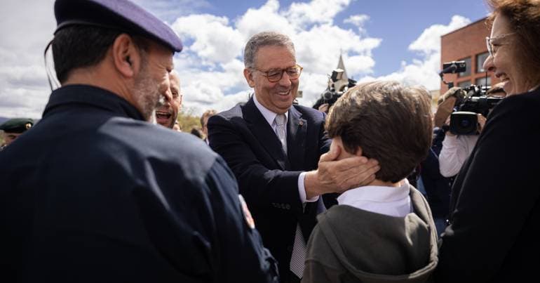 Seguro greeted by members of the public during the first changing of the Guard