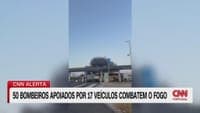 Warehouse facade and roof destroyed by flames in Camarate
