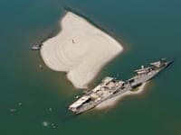 Remains of ancient mammoths and a Nazi-era shipwreck: Europe's increasingly dry rivers reveal relics of the past