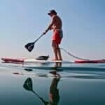 Surfer completes 900km Portugal paddle in tribute to Arran Strong